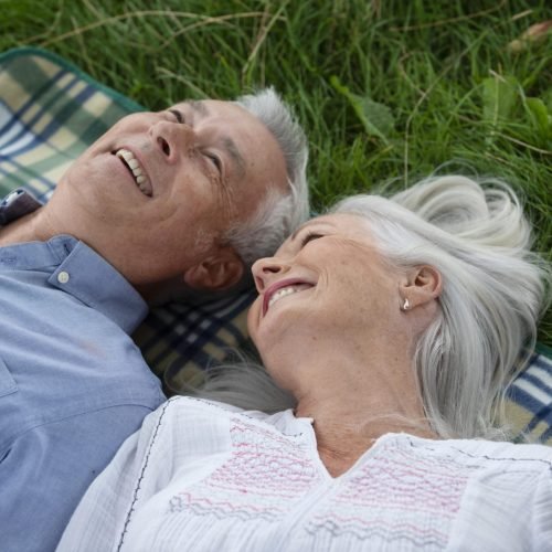 adorable-senior-couple-having-picnic-outdoors